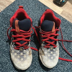 Boys under armour cleats size 3.5